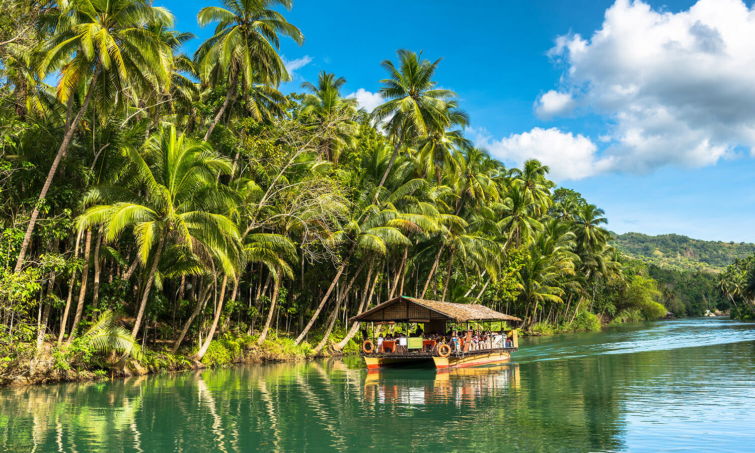 Loboc River cruise through emerald jungle in Bohol