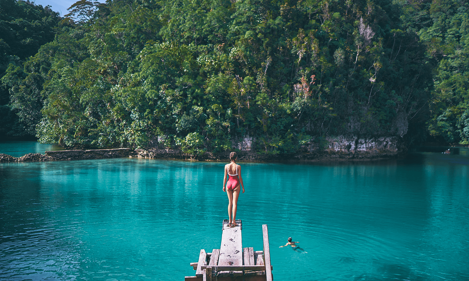 Sugba Lagoon diving board and emerald waters Siargao