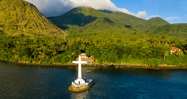 Sunken cemetery off the volcanic tropical island of Camiguin